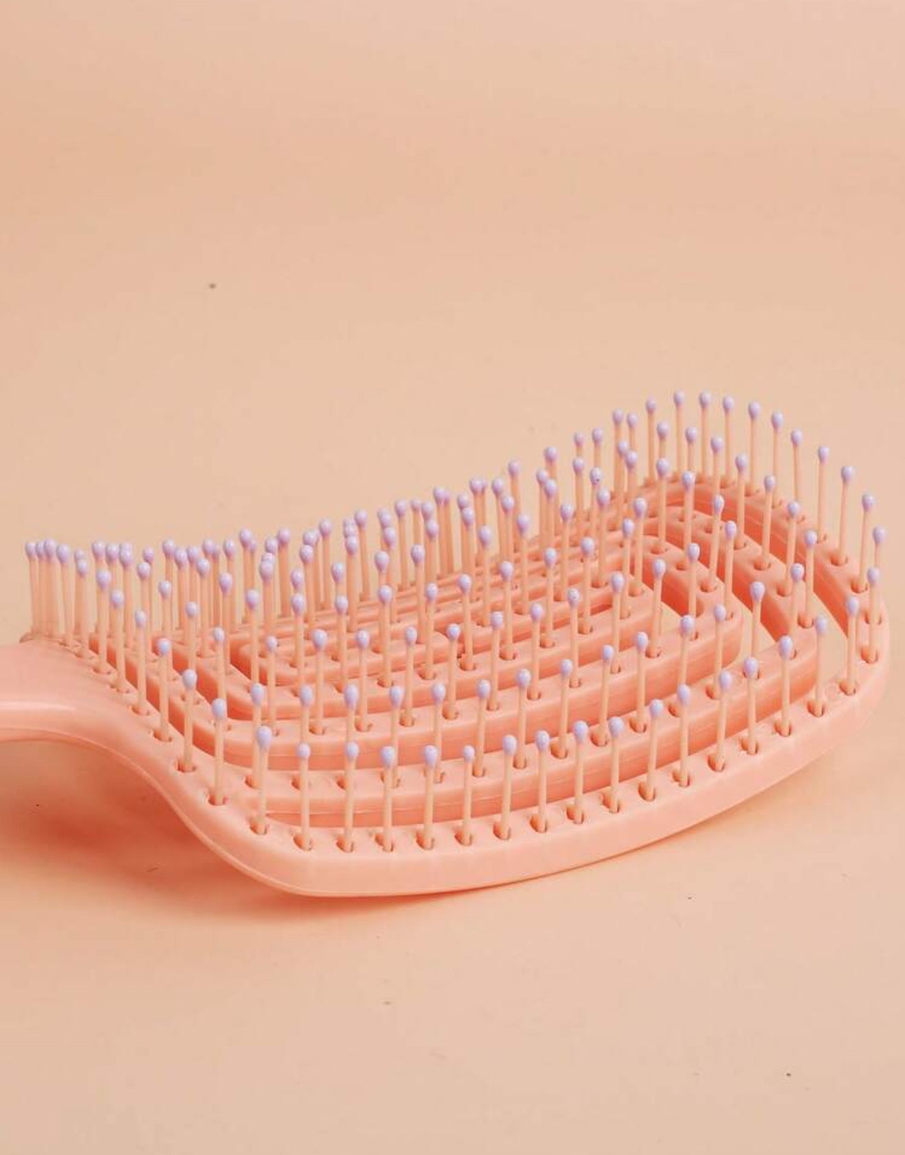 Curved brush